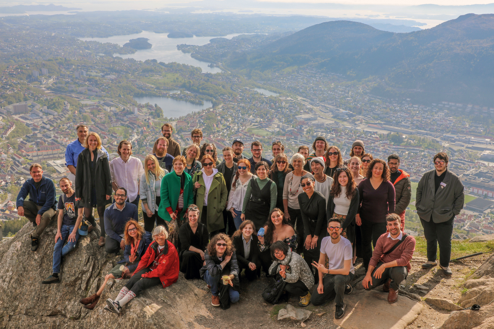 Group photo of the participants up in the mountains, with the city of Bergen in the background
